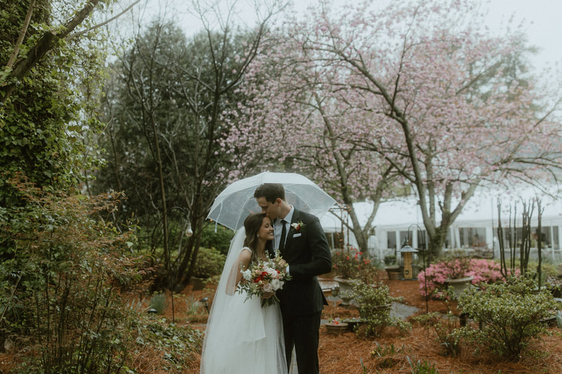 rainy wedding portraits in garden