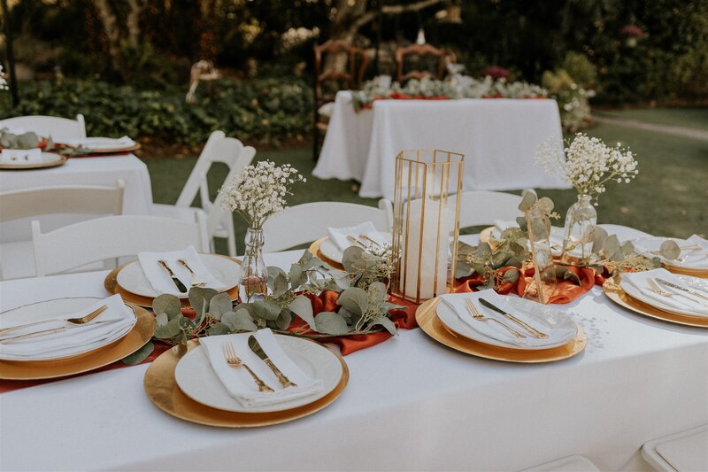 boho rust and gold reception tables