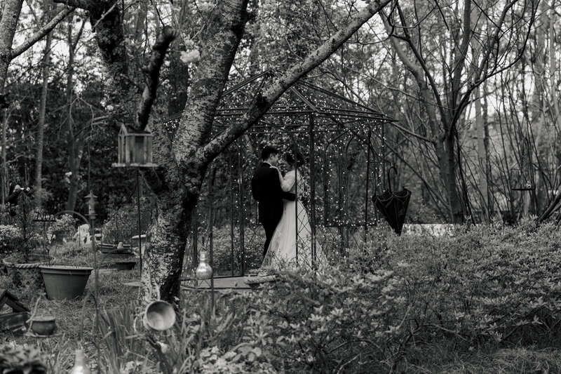 black and white photo of wedding garden gazebo