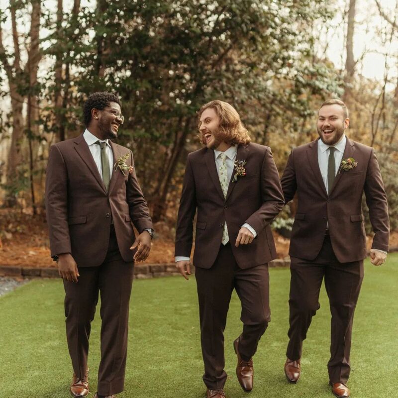 groom and groomsmen in brown suits