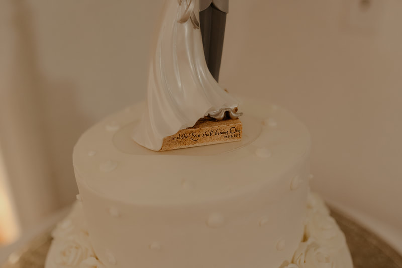 wedding cake topper with engraving of mark 10:8