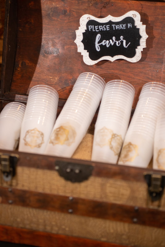 customized plastic cup wedding favors in brown trunk