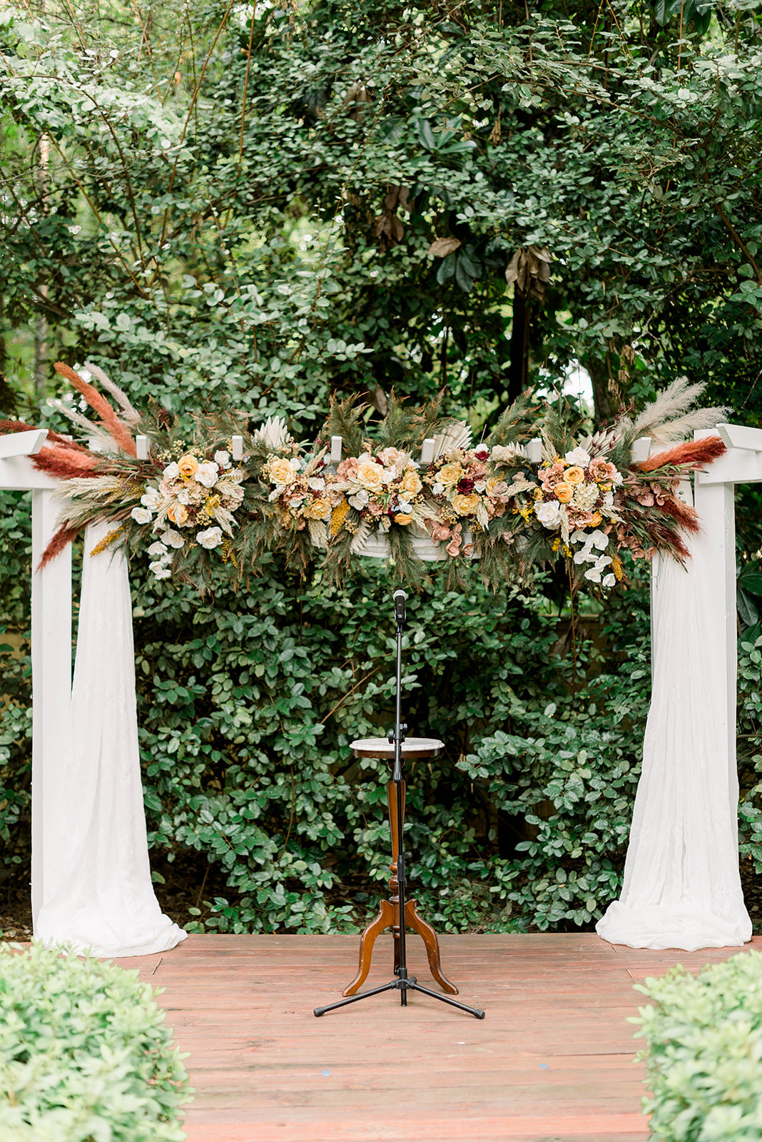 garden altar with bohemian floral arrangements