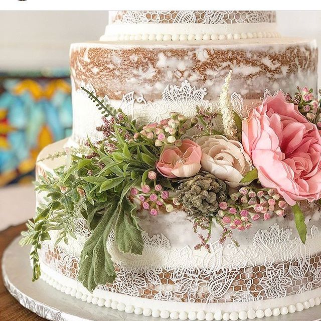 lace design on naked cake with florals
