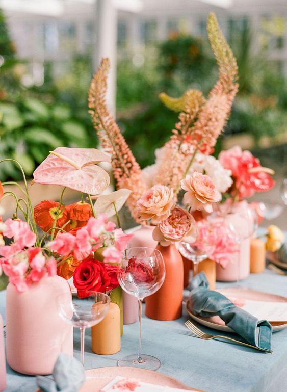 bold wedding colors palette with peach, blush, poppy, and dusty blue