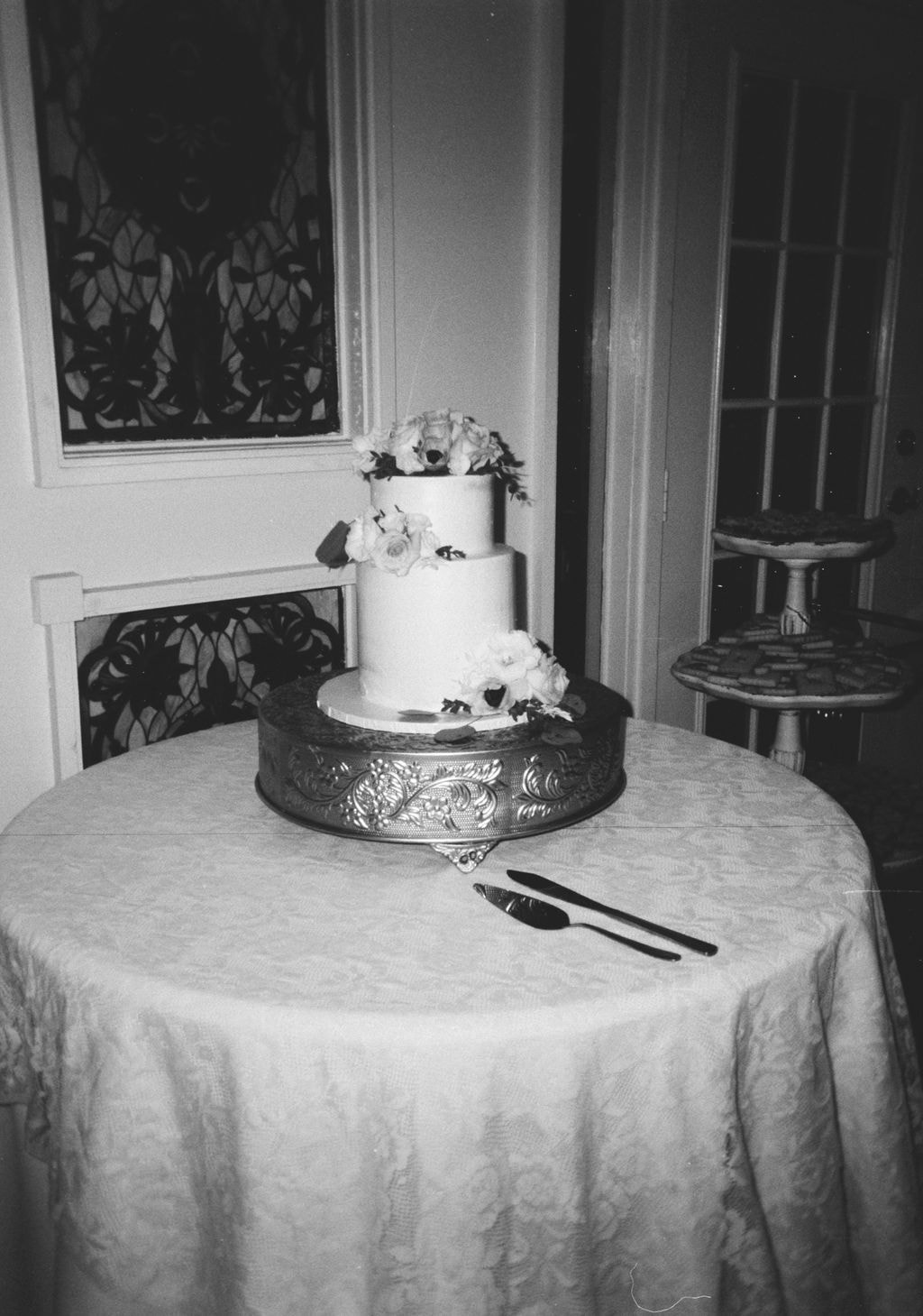 black and white film of wedding cake