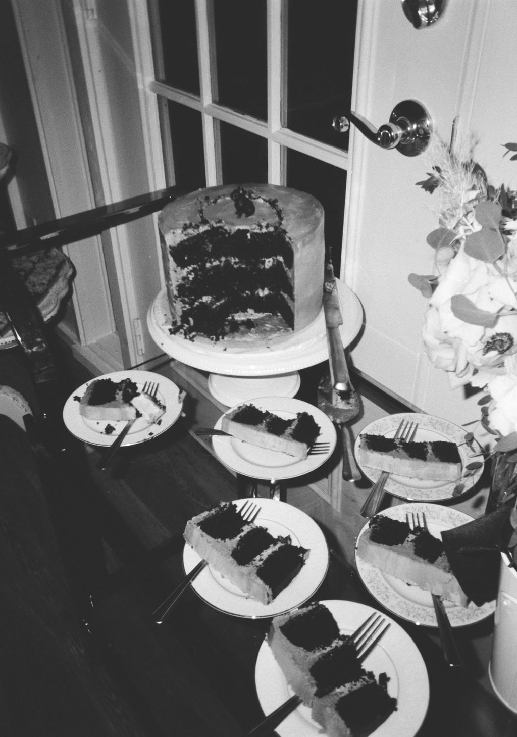 black and white film of groom's cake slices