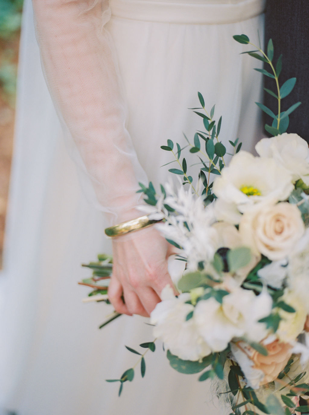 Bridal details with gold bracelet