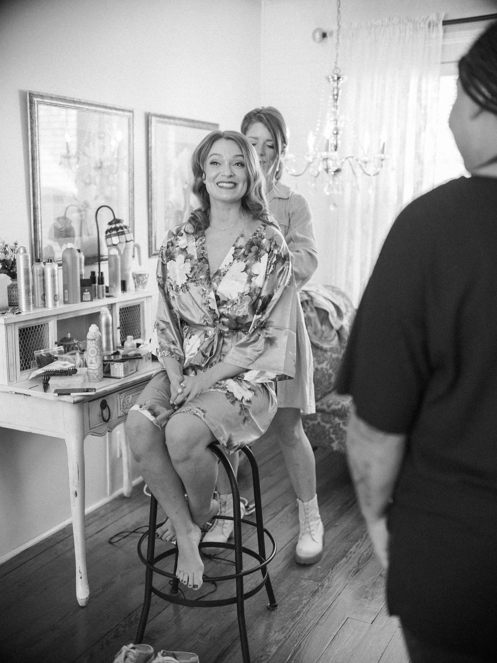 black and white photo of bridesmaids getting ready