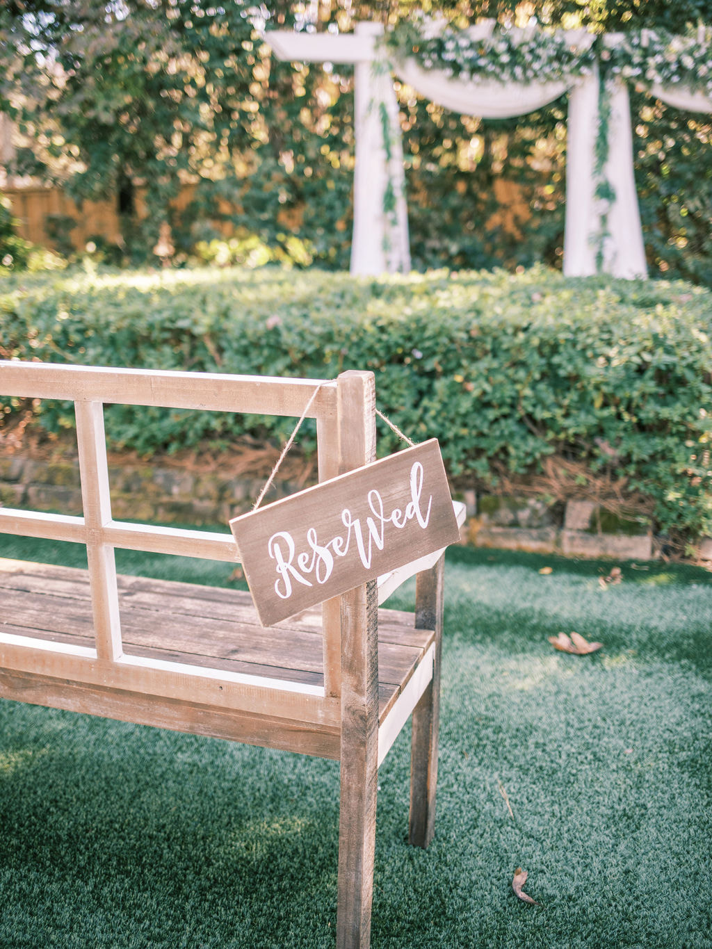 farmhouse bench reserved seating at garden ceremony