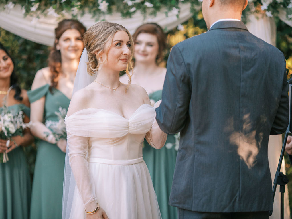 eucalyptus and neutral garden wedding ceremony