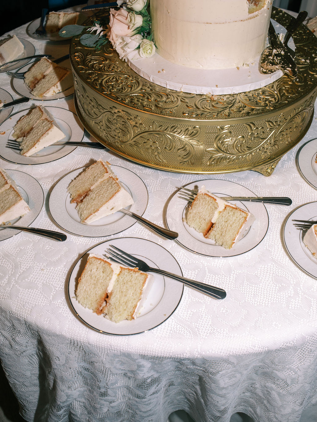 film photo of white wedding cake slices