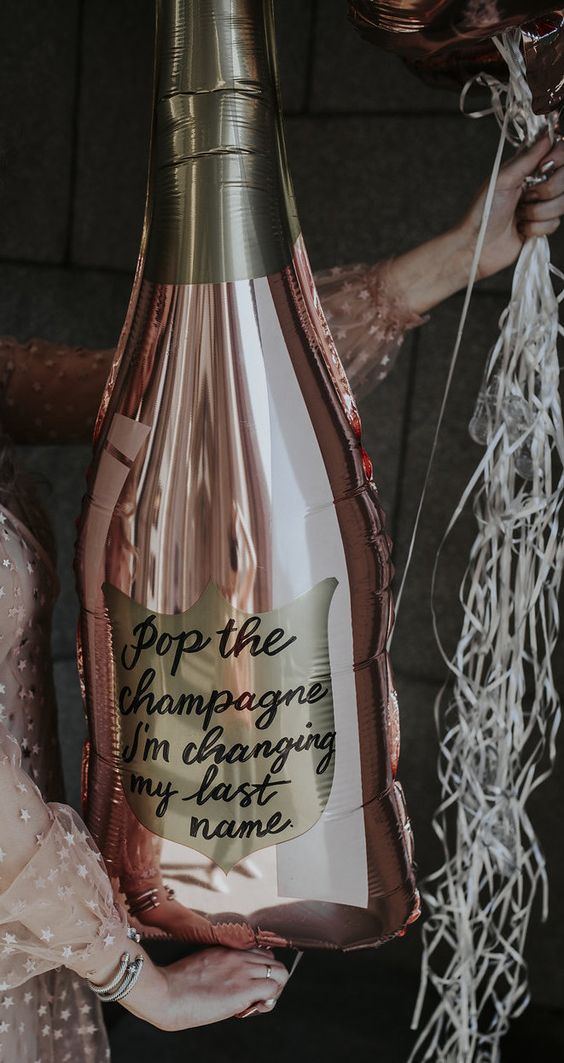 large champagne bottle shaped balloon