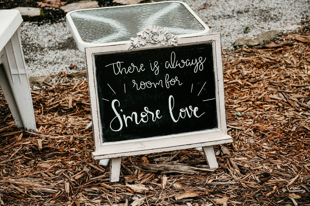 'There is always room for s'more love' chalkboard sign
