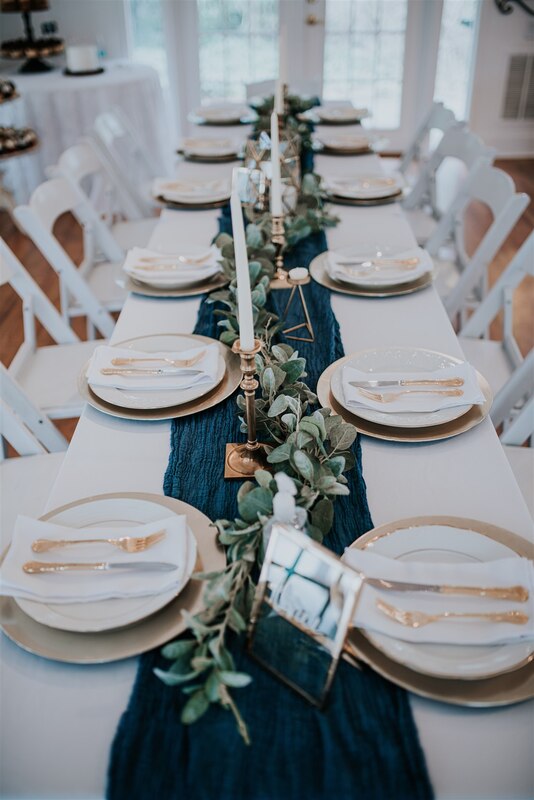navy and gold reception tables
