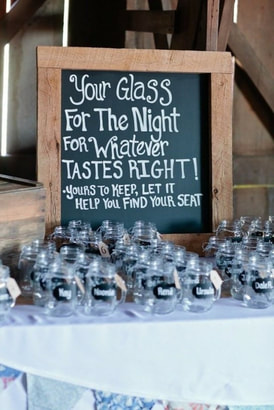 mason jar glasses with chalkboard sign 