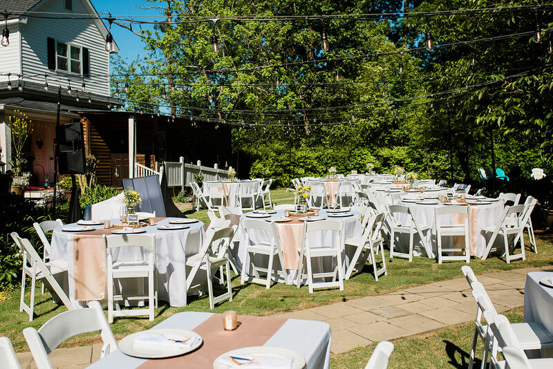 spring outdoor reception with champagne table decorations