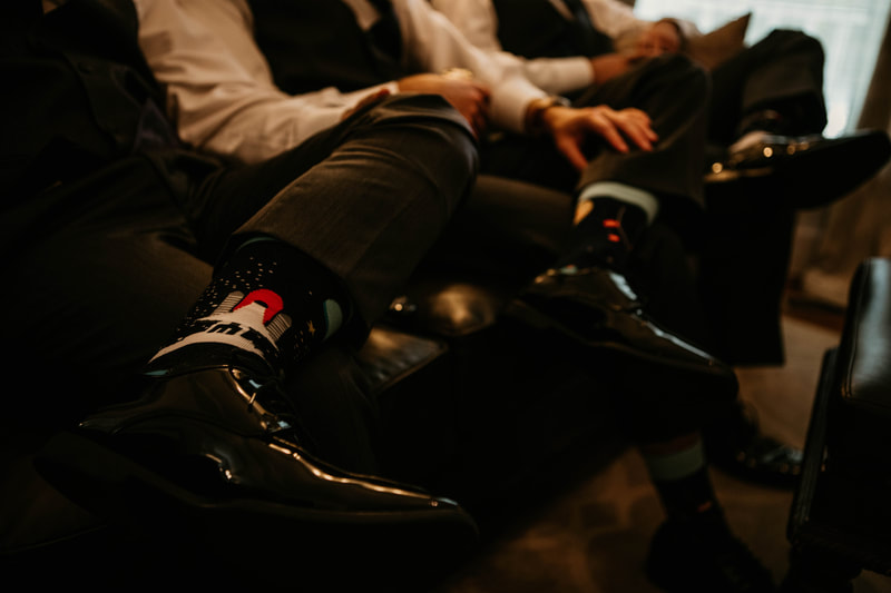 groomsmen with science themed socks