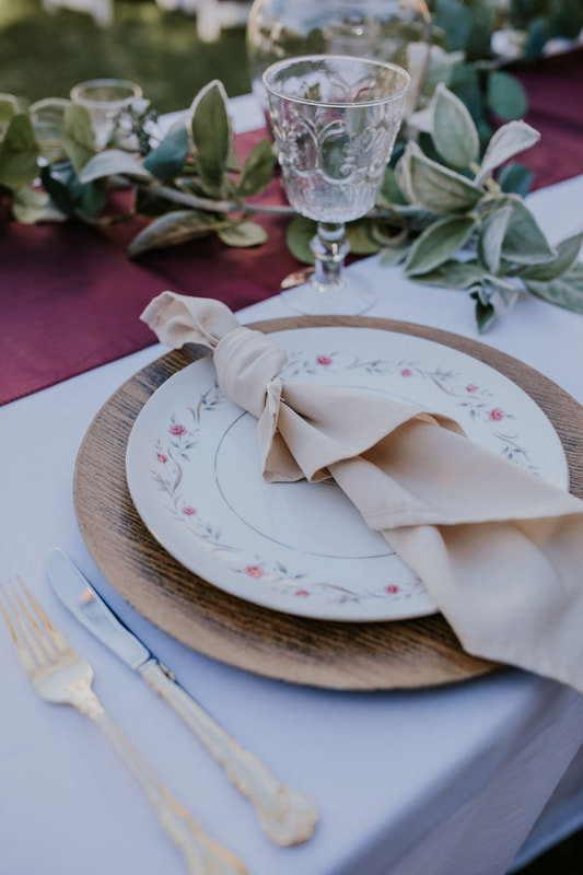 rustic elegant burgundy and neutral place setting