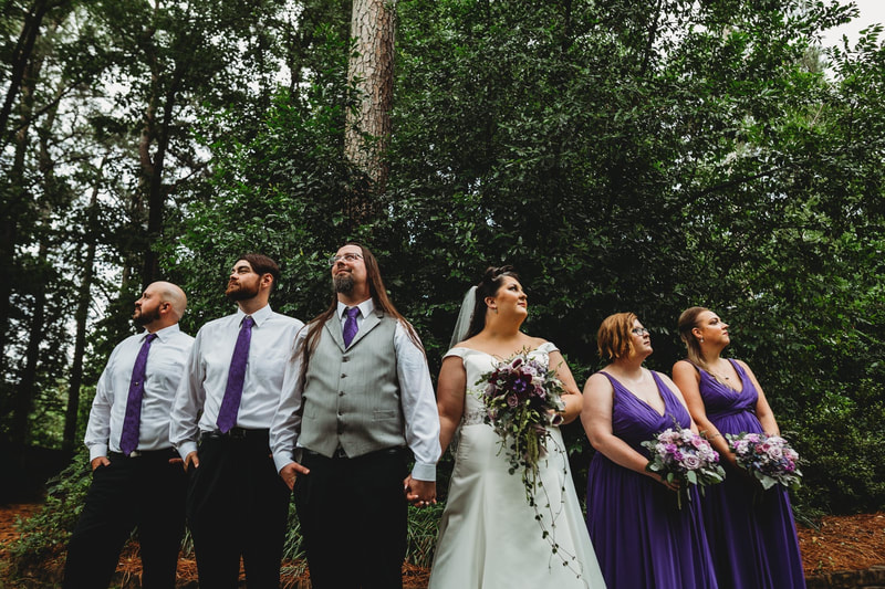 bridal party photos with men looking left and women looking right