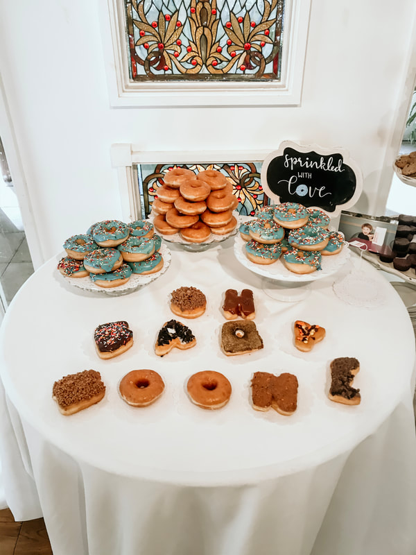 'oh baby boone' letter donuts for boy baby shower