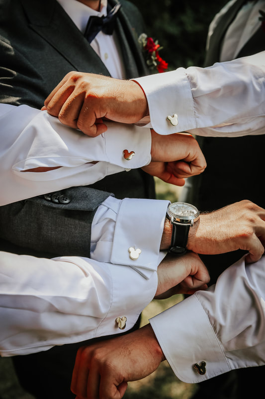 groomsmen with mickey mouse cufflinks