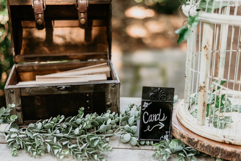 rustic card box and bird cage guestbook table