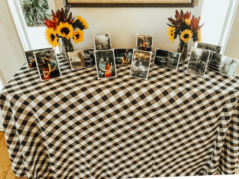 summer, country baby shower with sunflowers and buffalo plaid table cloth