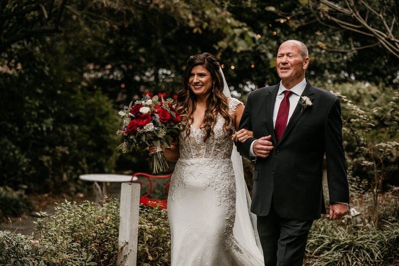 bride walking with dad down aisle