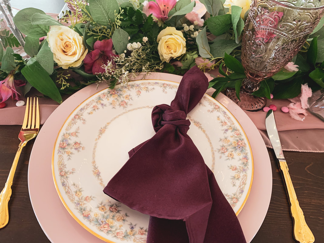 pink, gold and purple place setting