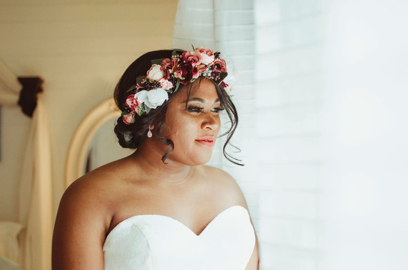 bride with white and blush flower crown