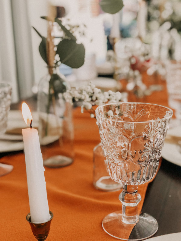 embossed clear drinking goblet at boho farm table