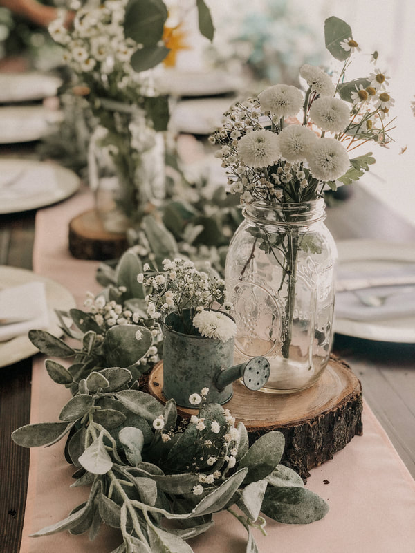 soft rustic centerpiece with mason jar filled with white florals