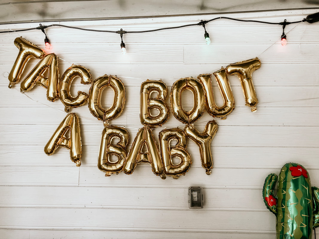 'Taco bout a baby' large, gold balloons for fiesta theme baby shower