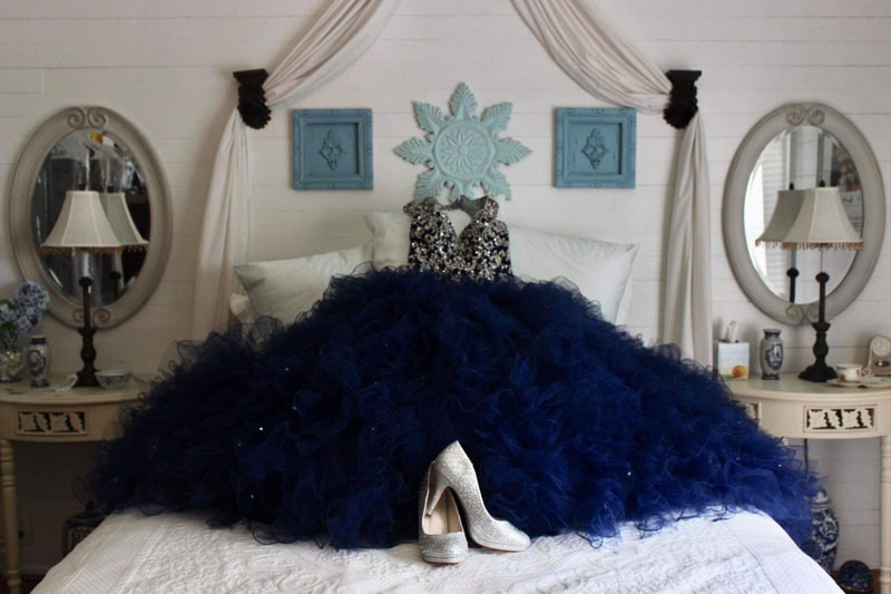 quinceanera blue dress with silver heels