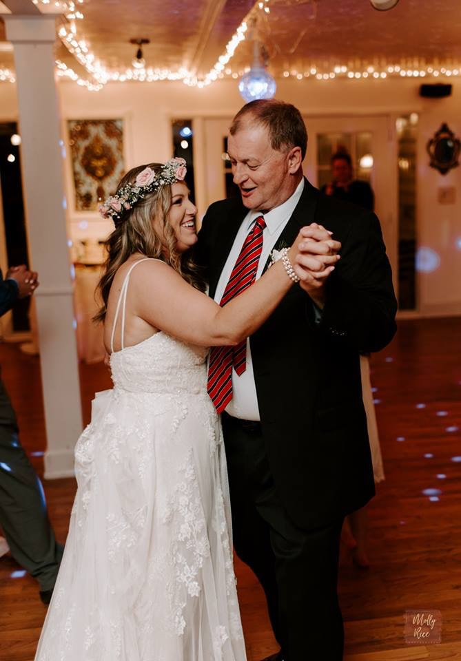 father daughter first dance inside carriage house