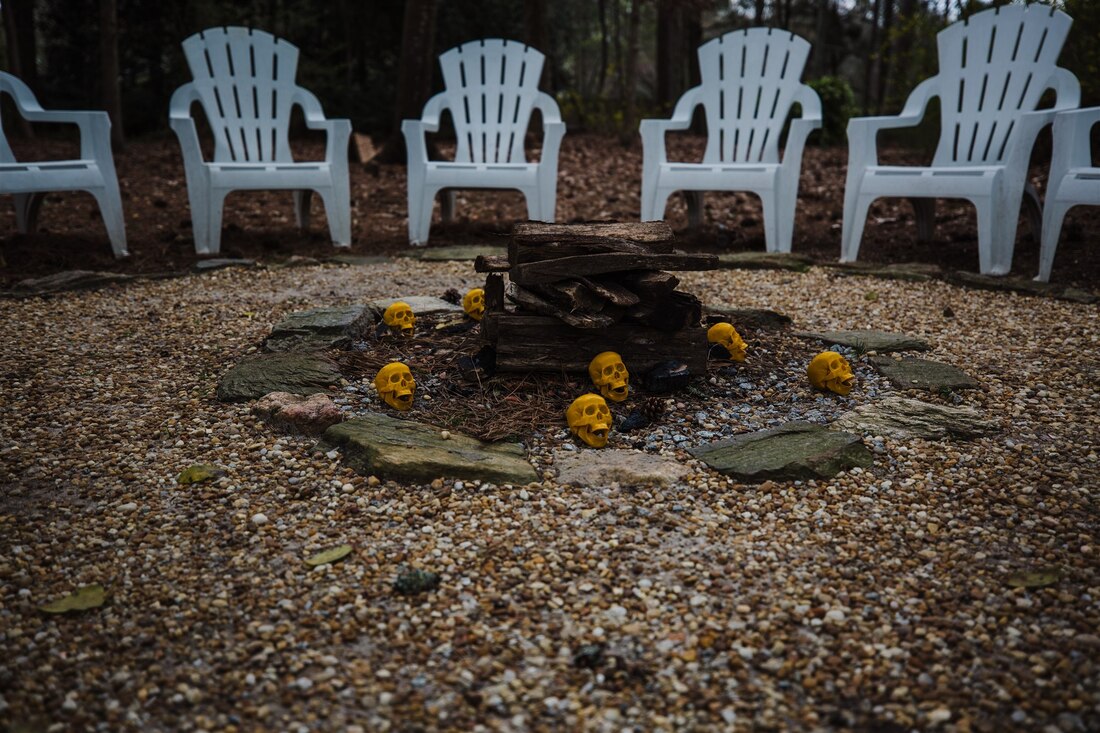 fire pit with yellow ceramic skulls