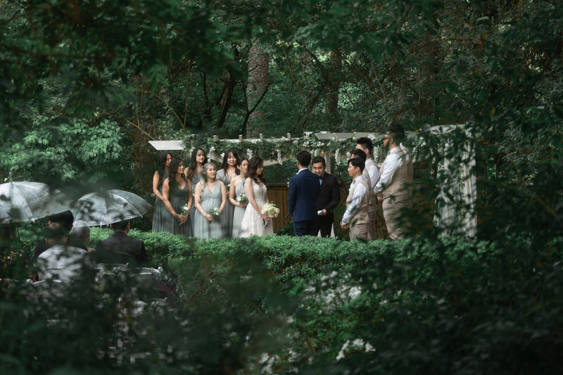Wooded view of garden venue wedding ceremony