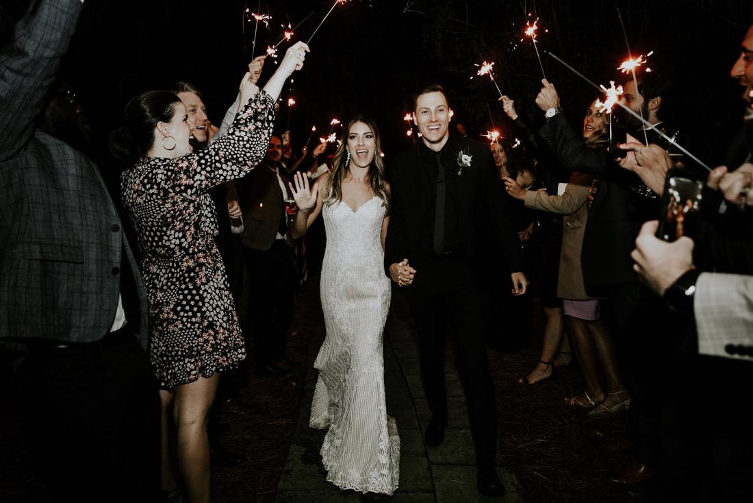 bride and groom walking out during sparkler grand exit