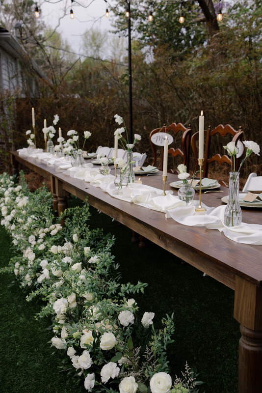 white floral head table