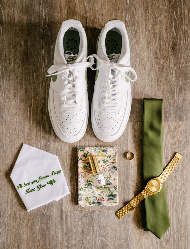 groom details with gold and olive green