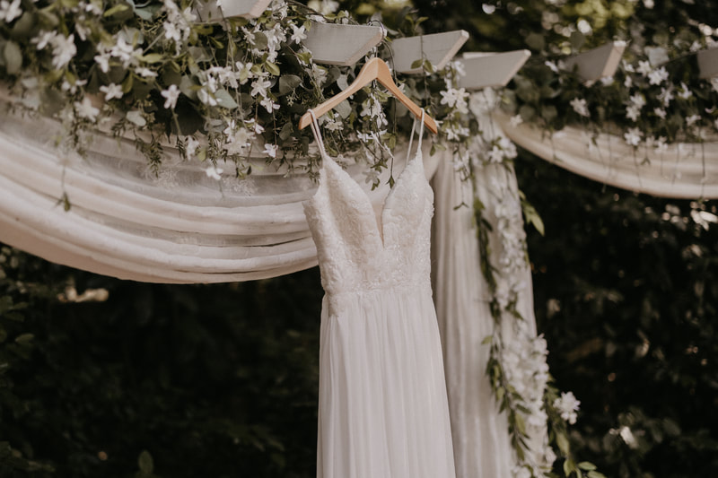 bride's dress on garden altar