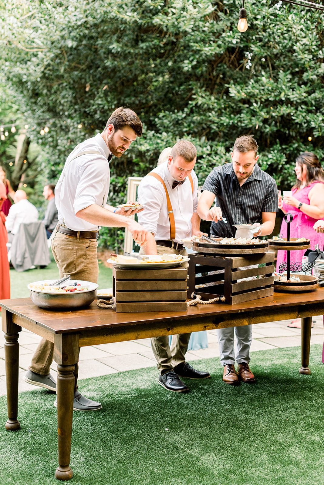 guests getting appetizers at garden venue