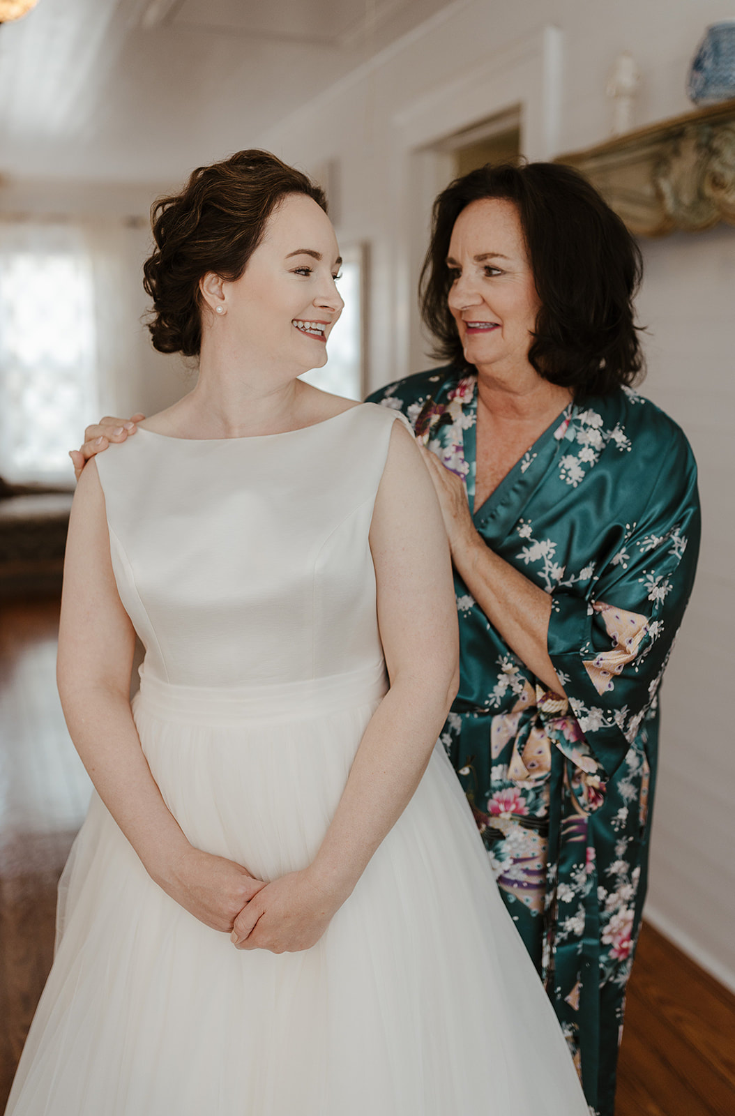 bride with mother in farmhouse bridal suite