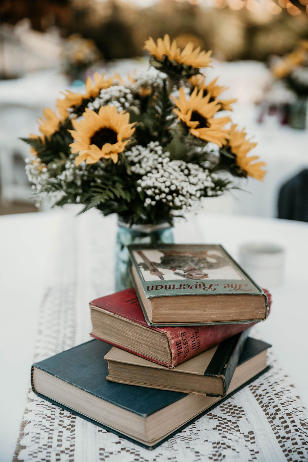 vintage books stacked as table centerpiece