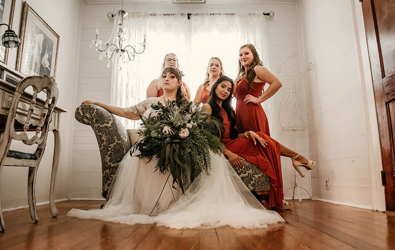 bridesmaids posing in bridal suite