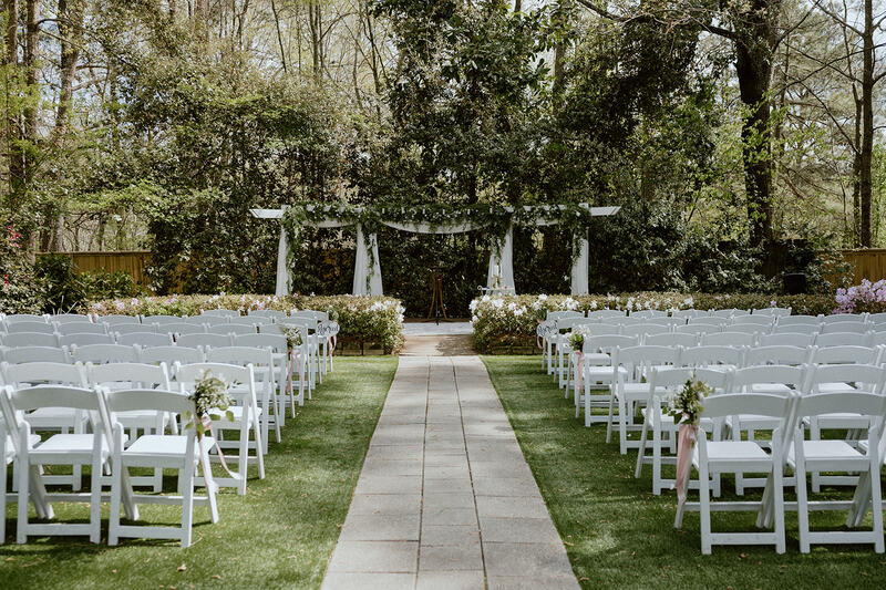 spring garden wedding ceremony with white florals